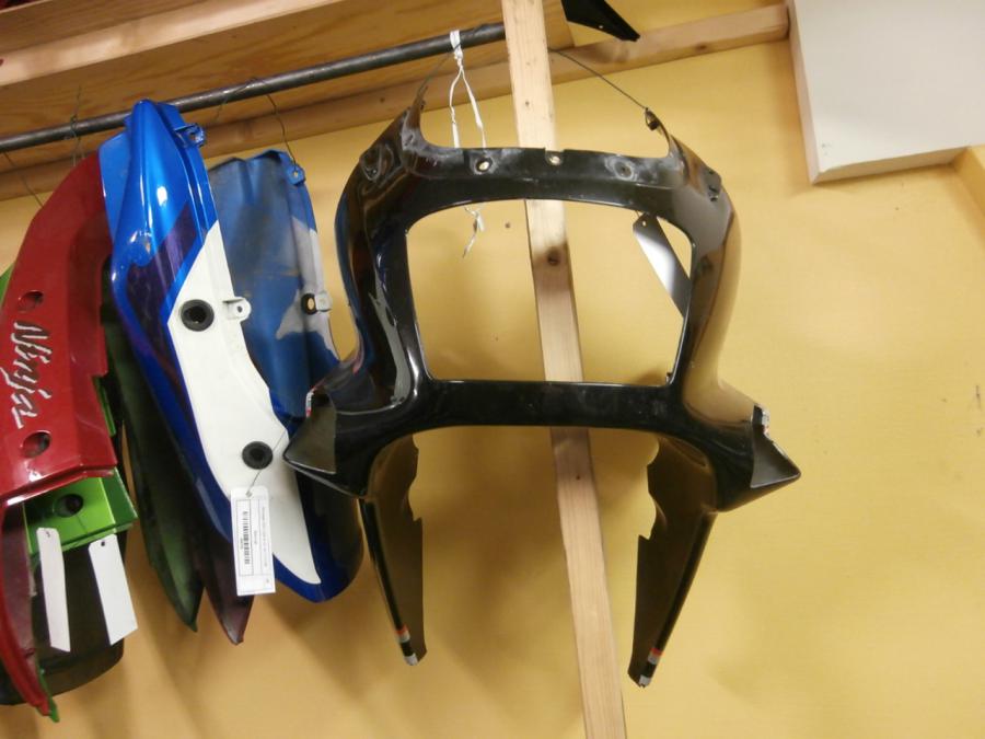 Vänster sida på Toppkåpa från en Kawasaki ZX-10 -1990 motorcykel.