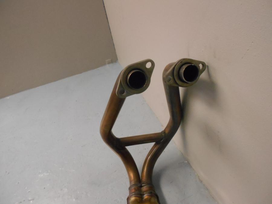 Baksidan på Grenrör från en Kawasaki Ninja 300 -2014 motorcykel.