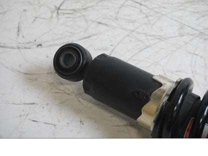 Vänster sida på Stötdämpare från en Kawasaki Ninja 300 -2013 motorcykel.