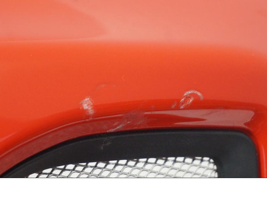 Snett nerifrån på Bensintankskåpa från en Ducati Monster 796 -2013 motorcykel.