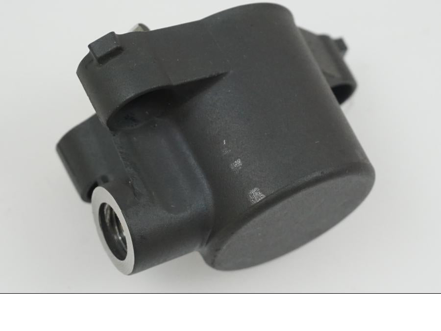 Snett uppifrån på Kopplingslavcylinder från en Ducati Monster 900 -1999 motorcykel.