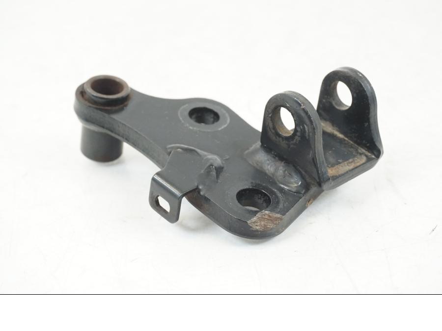 Baksidan på Fotpinnefäste från en Yamaha WR 125 -2011 motorcykel.