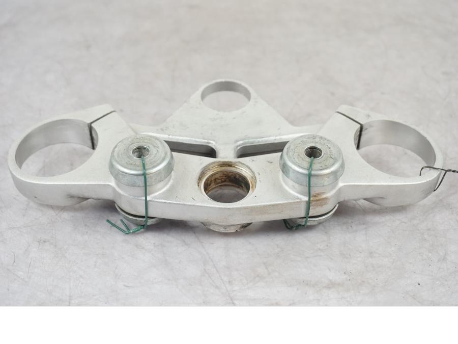 Snett uppifrån på Gaffelkrona från en Triumph Tiger -2009 motorcykel.