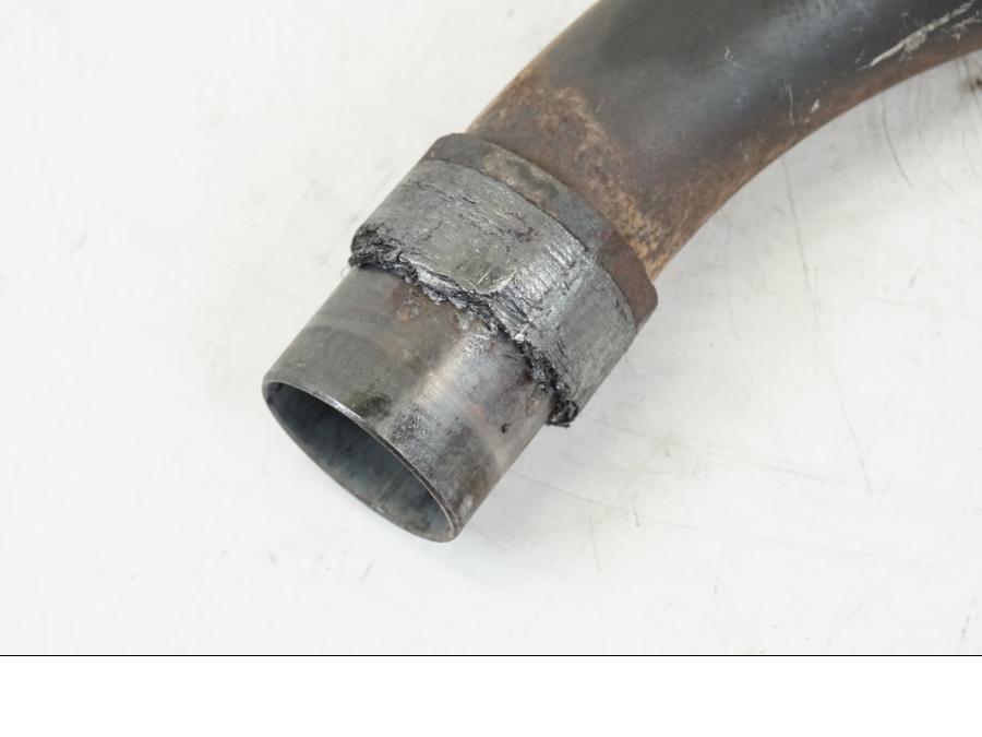 Baksidan på Grenrör från en Honda VFR 800 -2003 motorcykel.