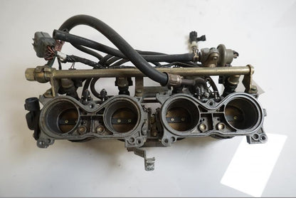 Baksidan på Spjällhus från en Honda CBR 900 RR -2000 motorcykel.