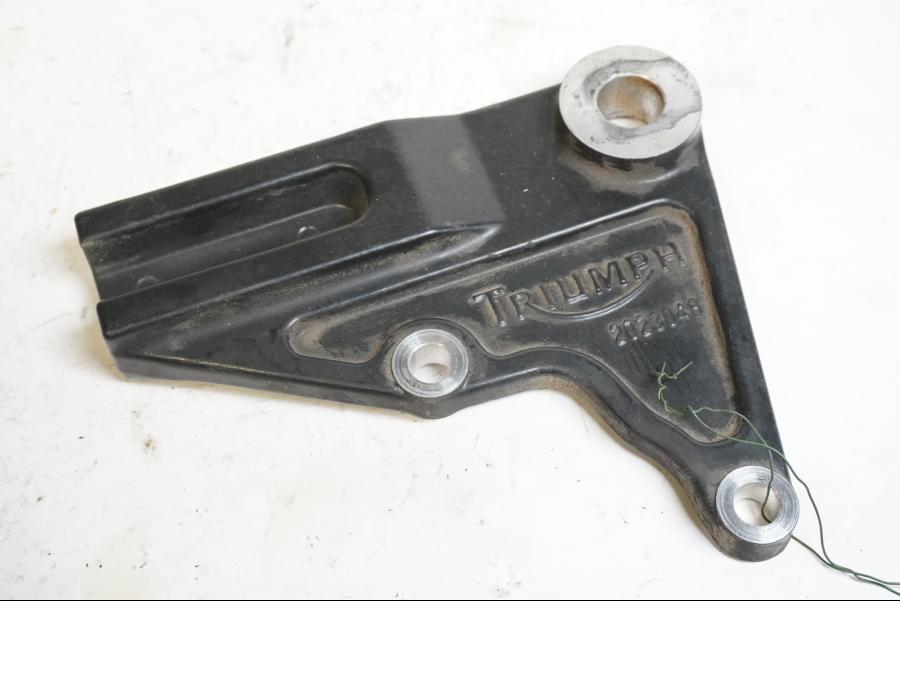 Framsidan på Bromsoksfäste från en Triumph Bonneville -2012 motorcykel.