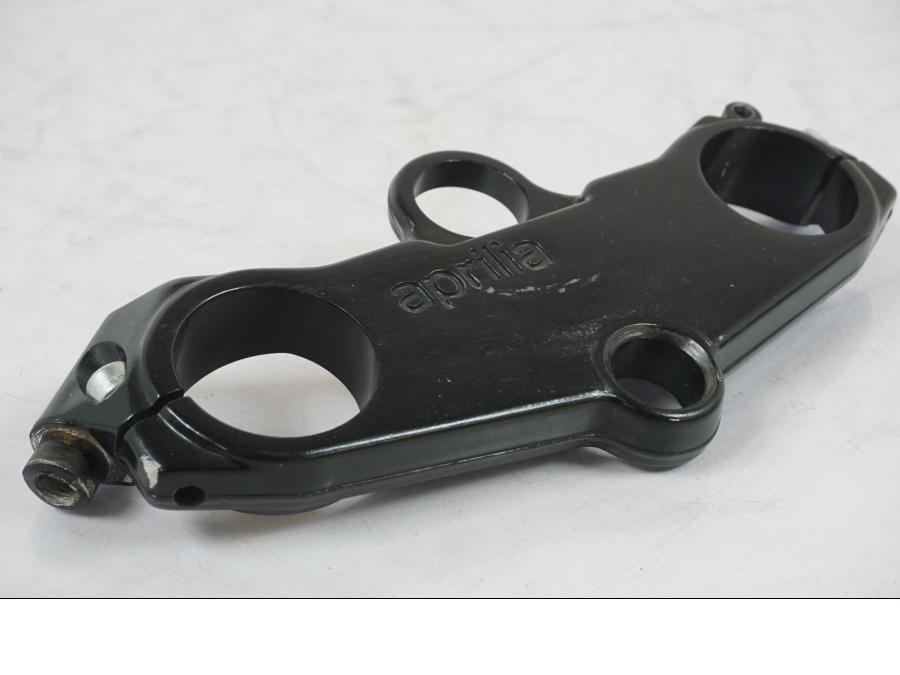 Höger sida på Gaffelkrona från en Aprilia RS 125 -2000 motorcykel.