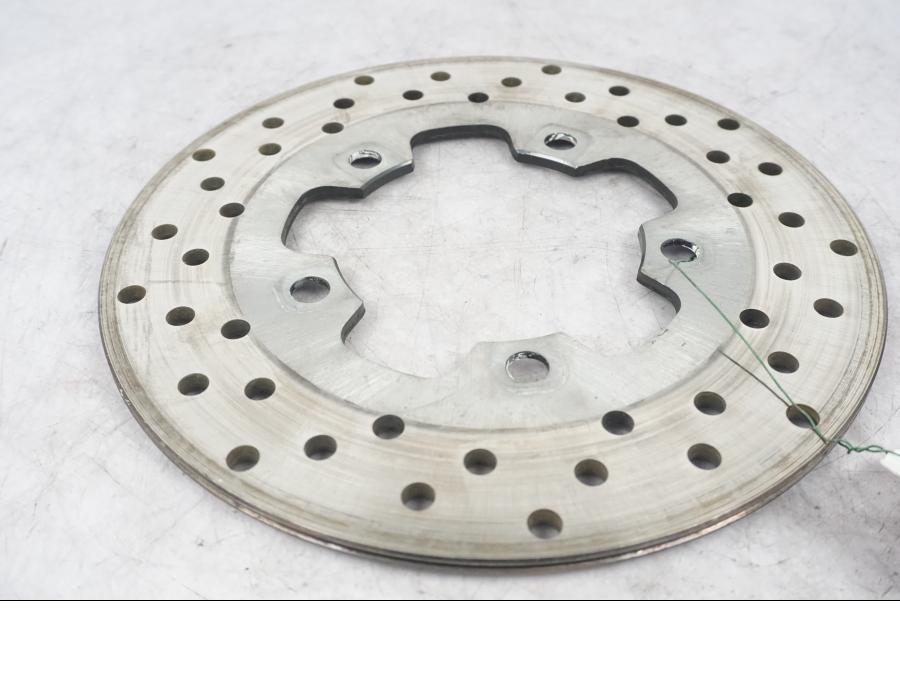 Höger sida på Bromsskiva från en Suzuki GSX-R 750 -2000 motorcykel.