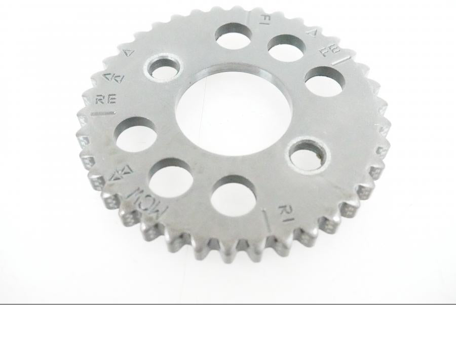 Baksidan på Kamkedjedrev från en Honda VFR 800 -2005 motorcykel.