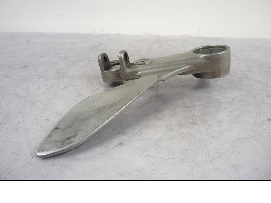 Vänster sida på Fotpinnefäste från en Honda VTR 1000 F -1997 motorcykel.