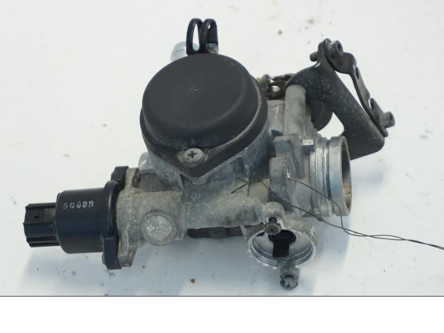 Baksidan på Spjällhus från en Yamaha X-Max 250 -2016 scooter.