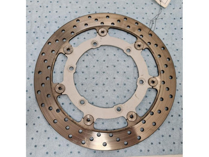 Baksidan på Bromsskiva från en Yamaha XVS 1300 -2008 motorcykel.