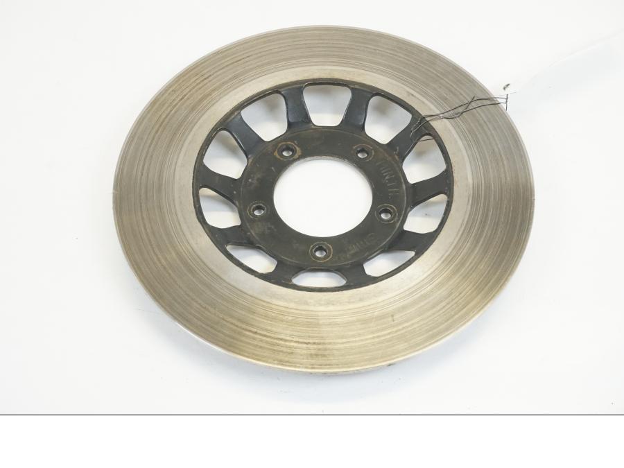 Baksidan på Bromsskiva från en Honda CB 125 T -1981 motorcykel.