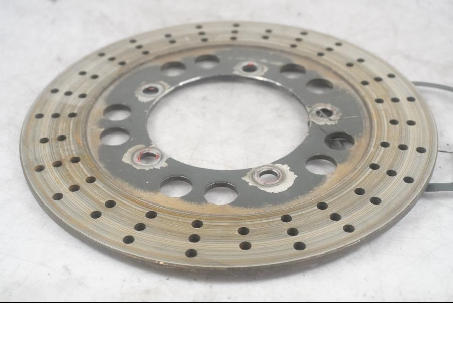 Höger sida på Bromsskiva från en Kawasaki ZZR 1200 -2002 motorcykel.