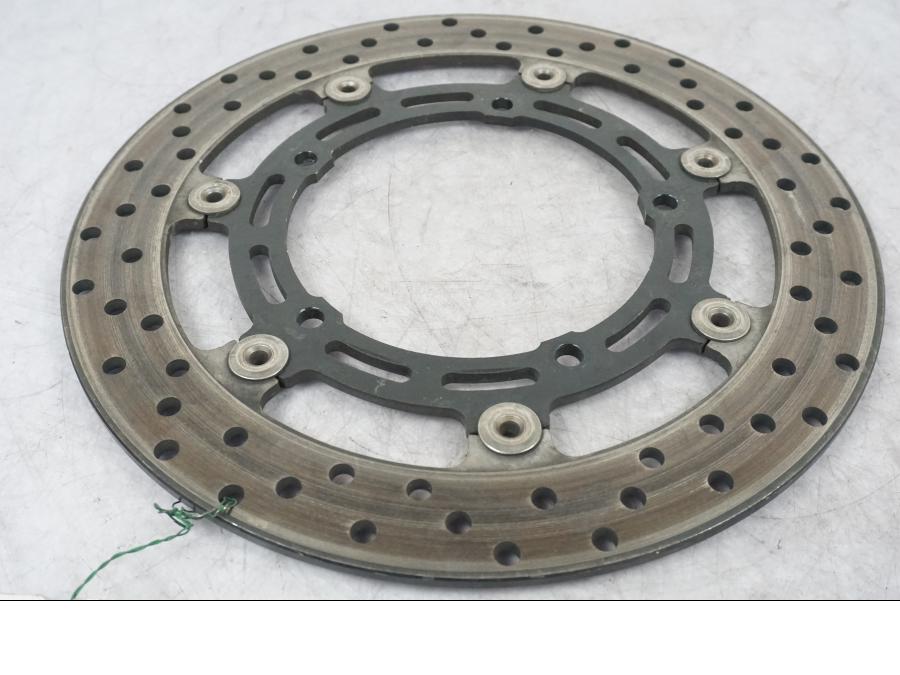 Framsidan på Bromsskiva från en Yamaha FZ-6 -2008 motorcykel.