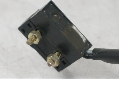 Baksidan på Bromsljuskontakt från en KTM 690 SM R -2009 motorcykel.