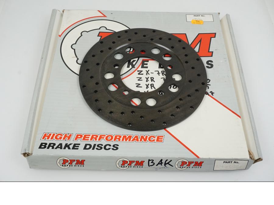 Framsidan på Bromsskiva från en Kawasaki ZX-9R -1997 motorcykel.