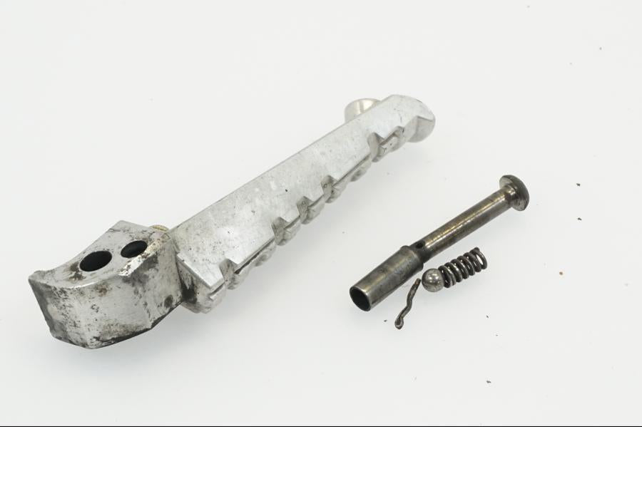 Vänster sida på Fotpinne från en Yamaha WR 125 -2010 motorcykel.