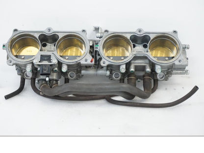 Framsidan på Spjällhus från en Honda CBR 1000 RR -2010 motorcykel.