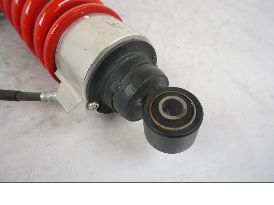 Vänster sida på Stötdämpare från en Kawasaki Versys 650 -2014 motorcykel.