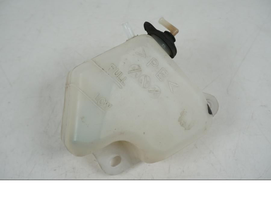 Framsidan på Vattenexpansionskärl från en Yamaha XT 660 X -2005 motorcykel.