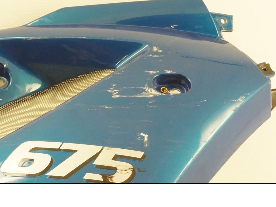 Snett uppifrån på Sidkåpa från en Triumph Daytona 675 -2008 motorcykel.