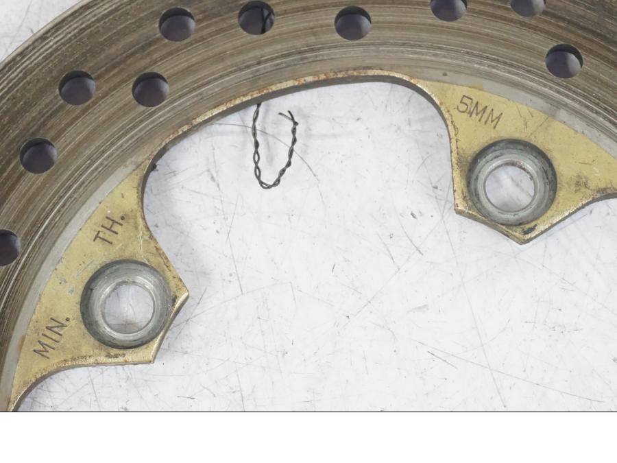 Vänster sida på Bromsskiva från en Kawasaki ZX-12R -2000 motorcykel.