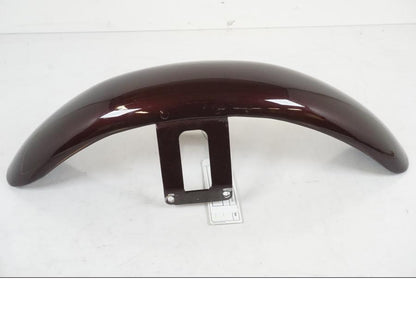 Snett nerifrån på <p>Framskärm från HD Softail Custom FXSTC 1987.</p>

<p>Repor samt mindre slitage av lack se bilder.</p> motorcykel.