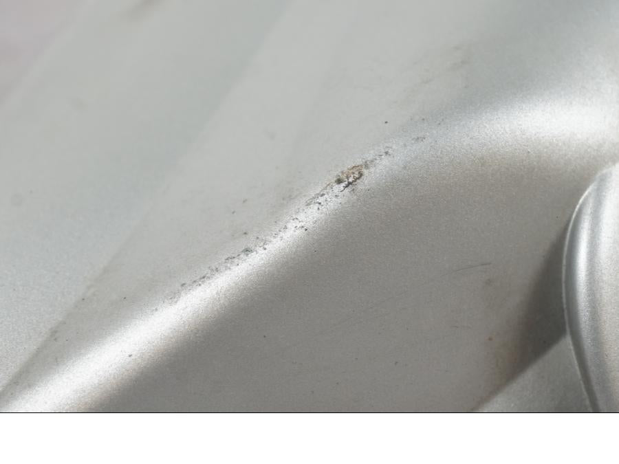 Vänster sida på Startmotorkåpa från en BMW R 1200 GS -2005 motorcykel.