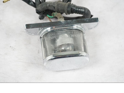 Höger sida på Skyltbelysning från en Honda VT 600 C -1998 motorcykel.