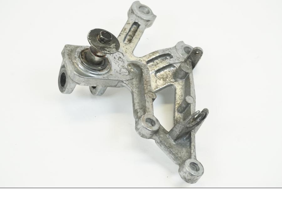 Vänster sida på Fotpinnefäste från en Kawasaki ZX-12R -2000 motorcykel.