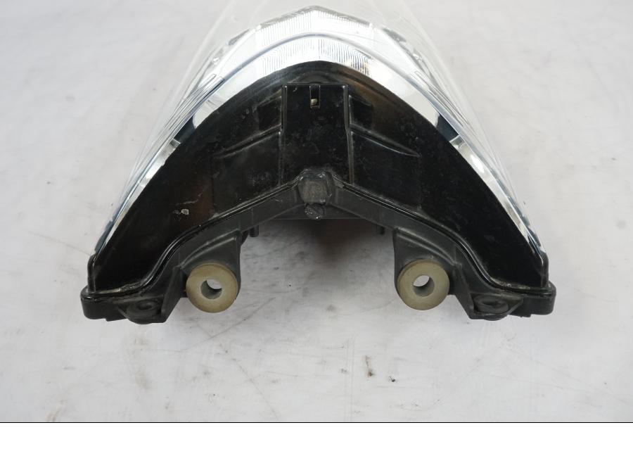 Vänster sida på Strålkastare från en Kawasaki ER-6N -2012 motorcykel.