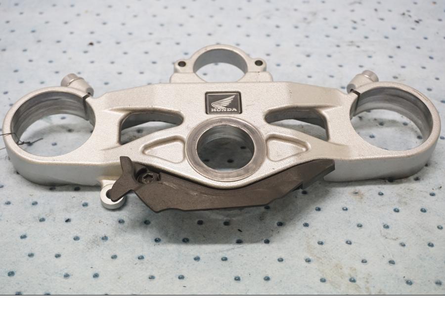 Framsidan på Gaffelkrona från en Honda CBR 1000 RR -2011 motorcykel.