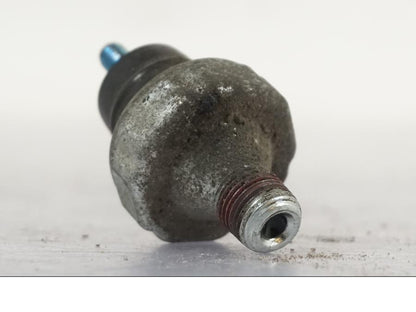 Baksidan på Oljetryckgivare från en H-D Sportster 883 XL -2007 motorcykel.