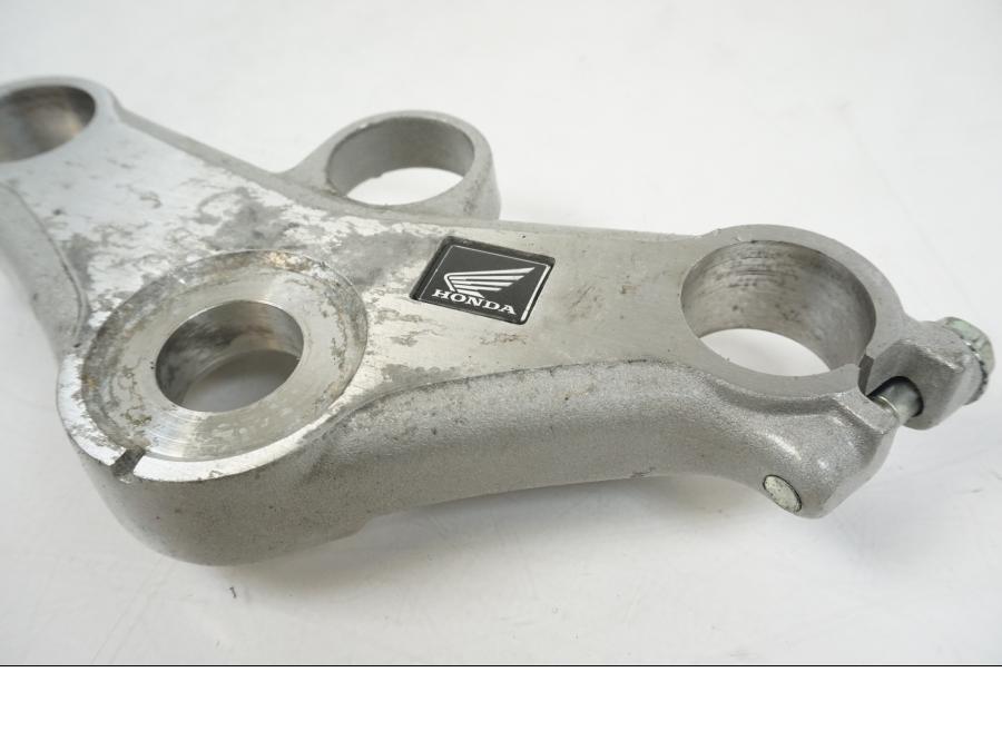 Höger sida på Gaffelkrona från en Honda CBR 125 R -2006 motorcykel.