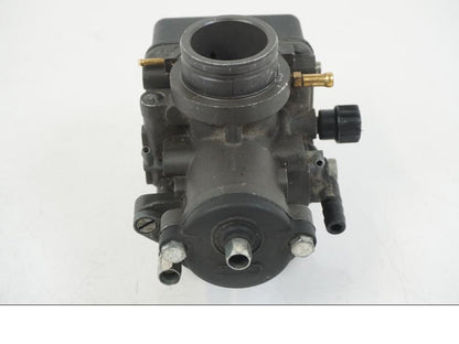 Vänster sida på Förgasare från en Aprilia RS 125 -2008 motorcykel.