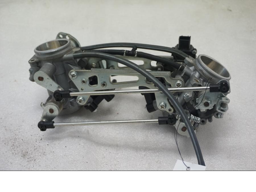 Framsidan på Spjällhus från en Suzuki SV 650 -2016 motorcykel.