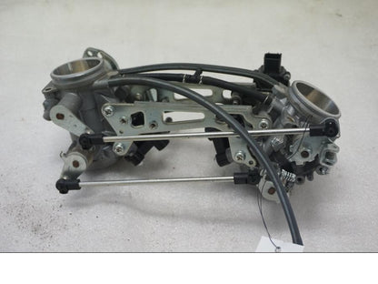 Framsidan på Spjällhus från en Suzuki SV 650 -2016 motorcykel.