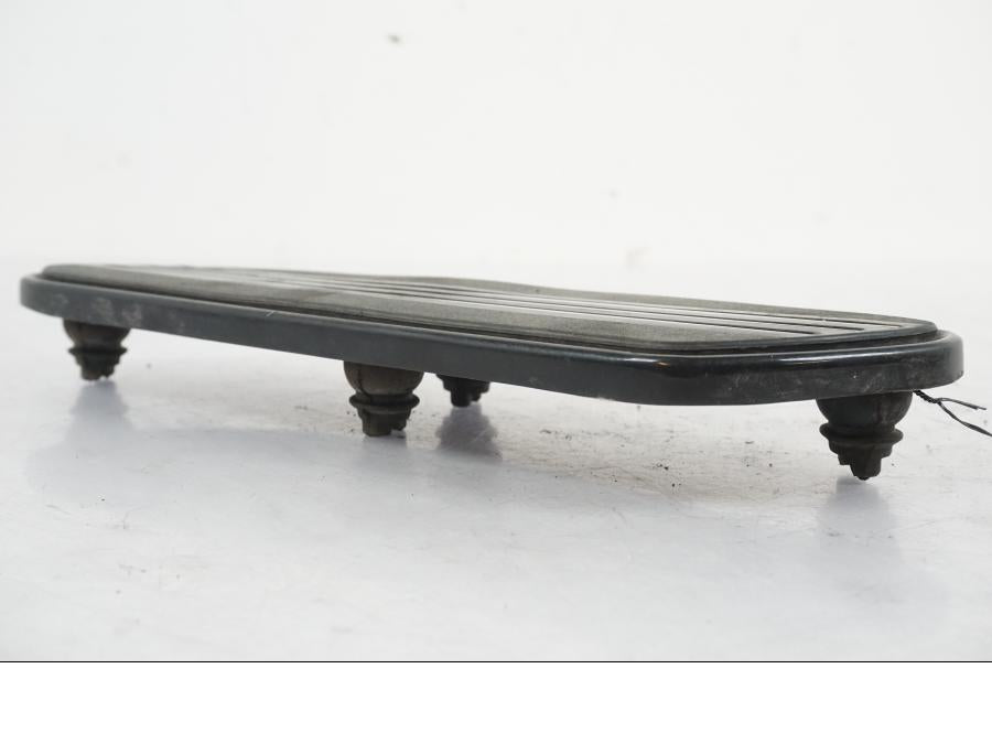 Framsidan på Fotplatta från en H-D Street Glide FLHX -2012 motorcykel.