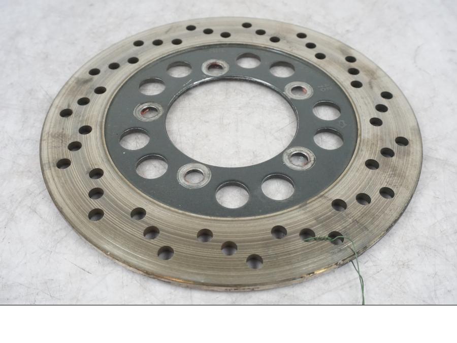 Höger sida på Bromsskiva från en Kawasaki ZX-7R -1996 motorcykel.