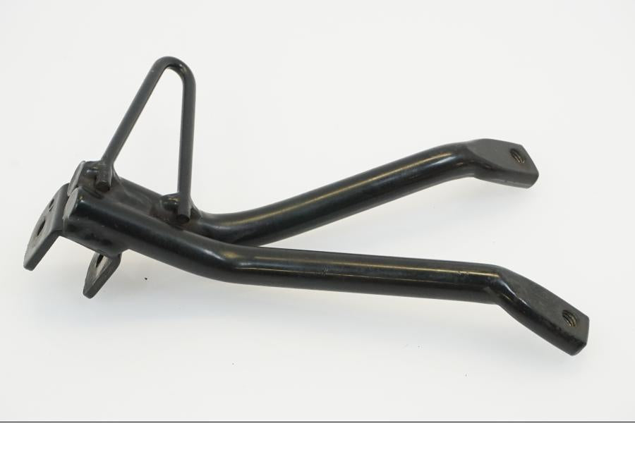 Vänster sida på Fotpinnefäste från en Yamaha WR 125 -2010 motorcykel.