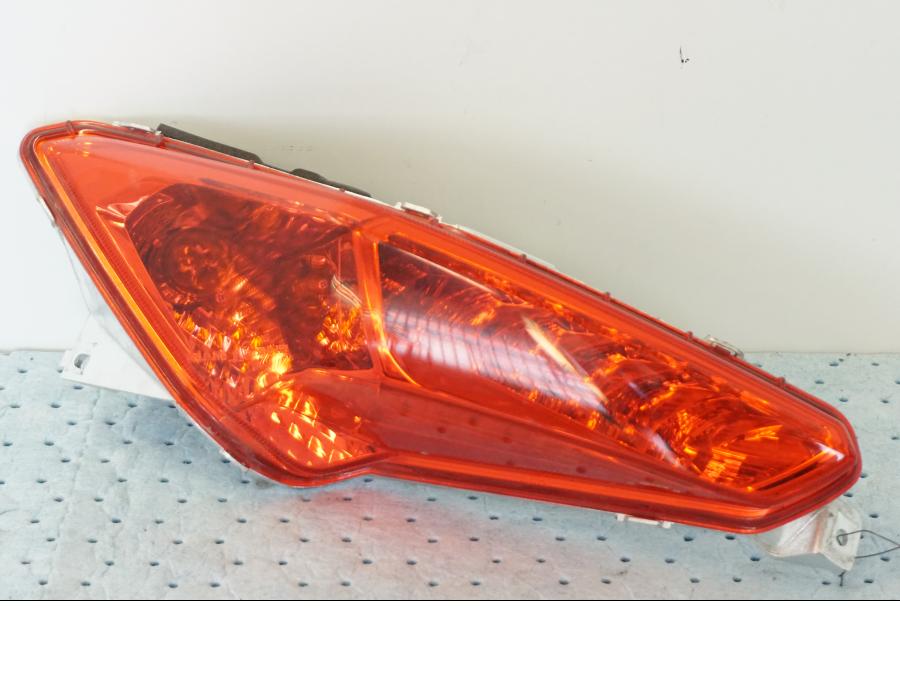 Framsidan på Baklampa från en Yamaha X-Max 250 -2016 scooter.