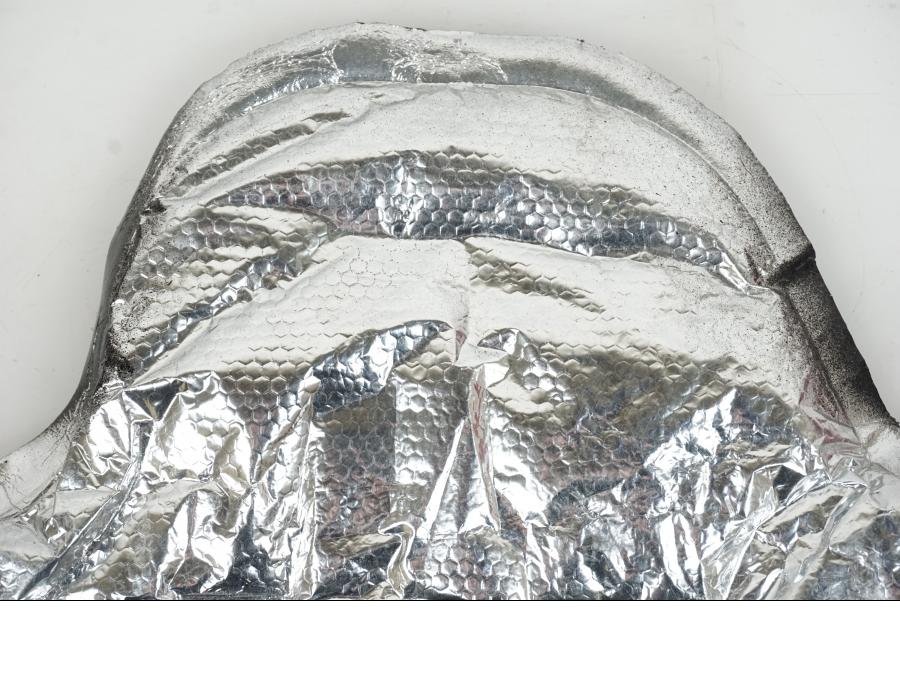 Baksidan på Värmeskydd från en Suzuki GSX-R 750 -2009 motorcykel.