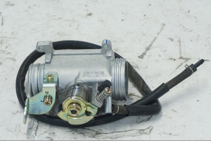 Framsidan på Spjällhus från en Kymco Agility 125 -2019 scooter.