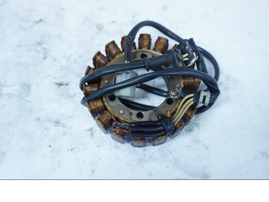 Baksidan på Generator från en Honda XL 600 V -1994 motorcykel.