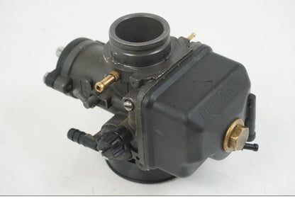 Baksidan på Förgasare från en Aprilia RS 125 -2008 motorcykel.