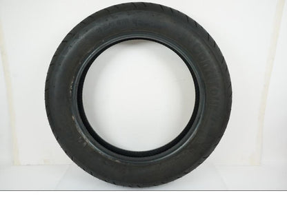 Framsidan på <p>Däck: Continental Contitour.</p>

<p>Dimension: 130/90-16 M/C 67H.</p>

<p>Tillv. 1719.</p>

<p>Mönsterdjup: ca. 60 %, Begagnad däck.</p> moped.