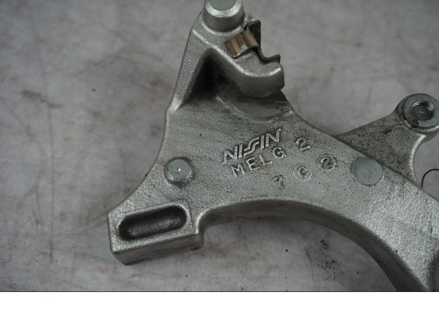 Baksidan på Bromsoksfäste från en Honda CBR 1000 RR -2007 motorcykel.