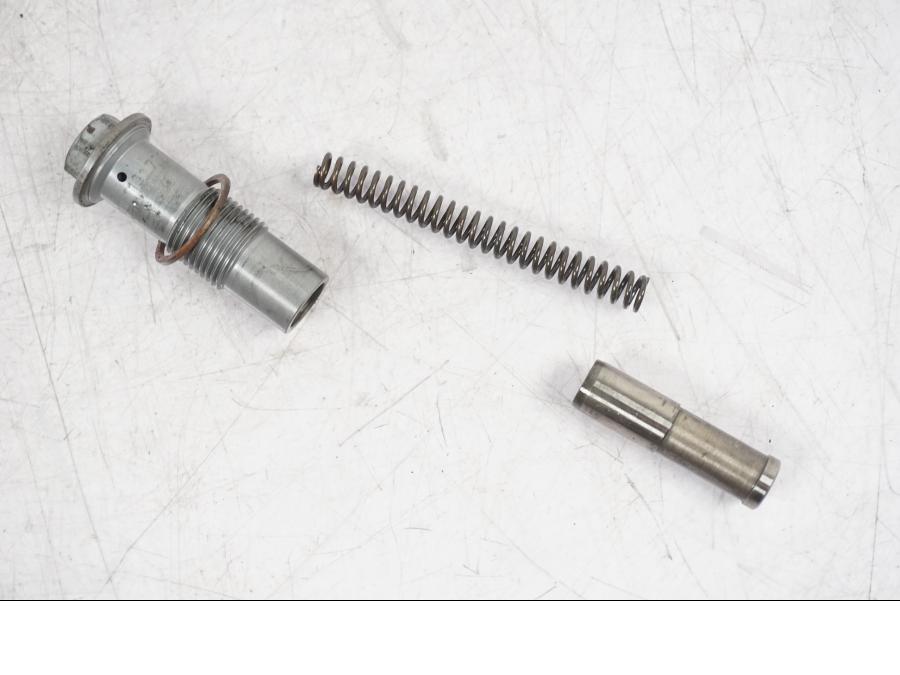 Vänster sida på Kamkedjesträckare från en BMW R NineT -2017 motorcykel.