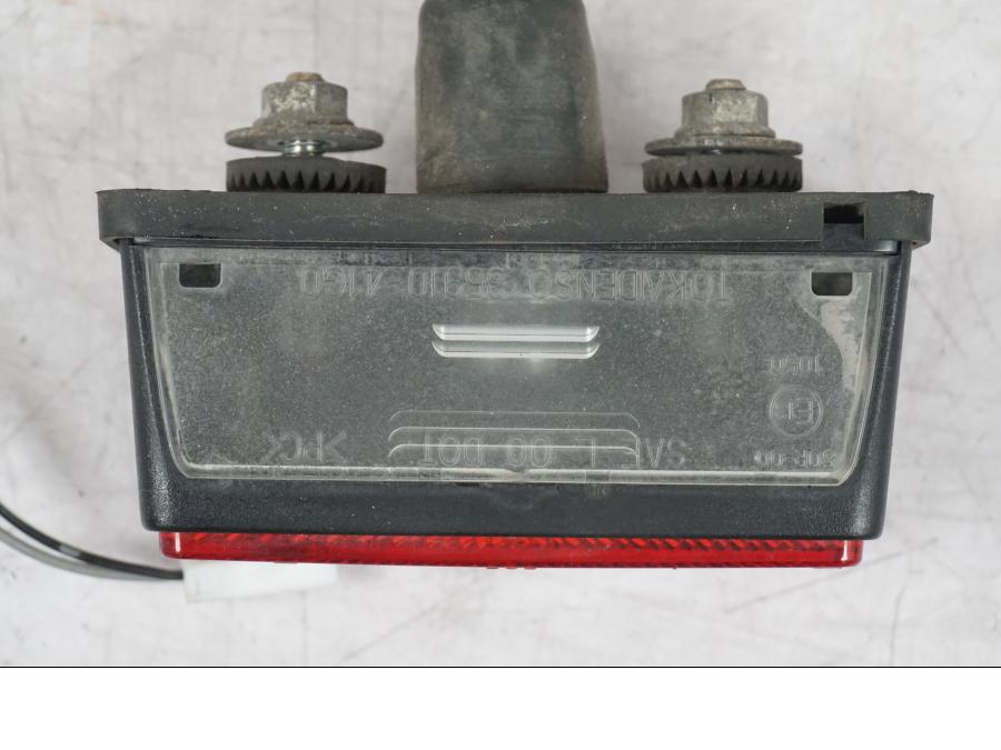 Snett uppifrån på Skyltbelysning från en Suzuki GSF 1250 -2010 motorcykel.